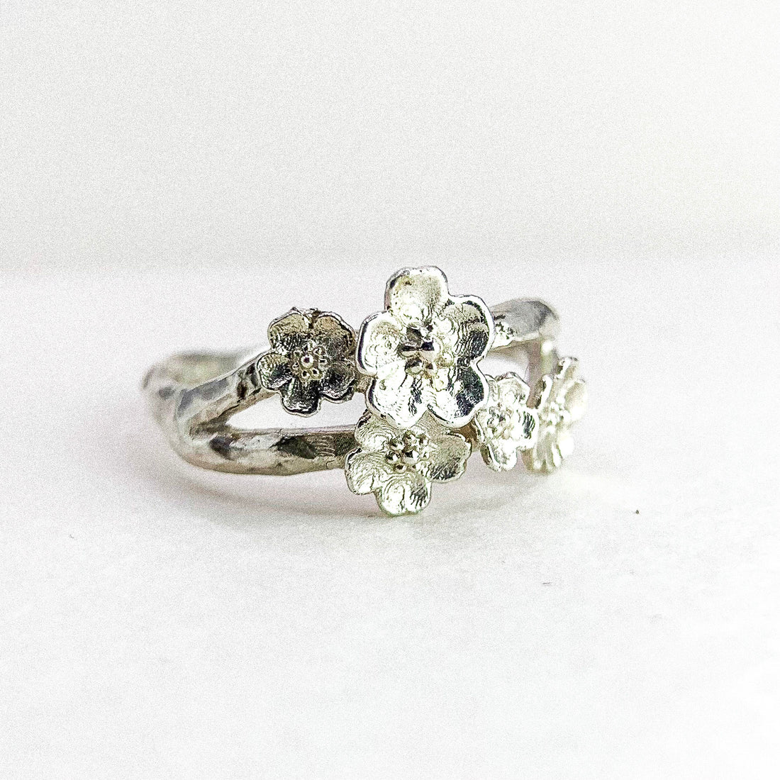 MULTI FLOWER SILVER RING