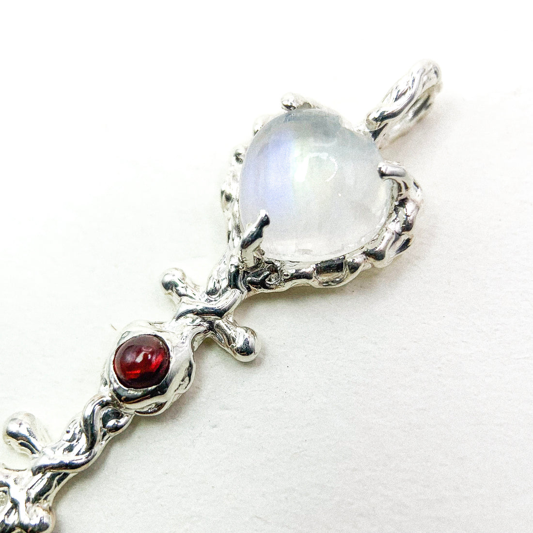 MOONSTONE AND GARNET KEY SILVER PENDANT